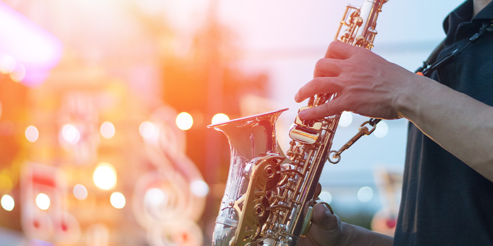 Man playing the saxaphone at the Riverfront Jazz Festival in Dallas.