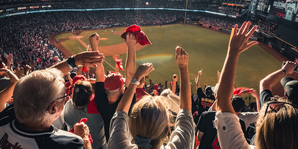 Crowd cheering during New Hampshire's Minor League Baseball game.