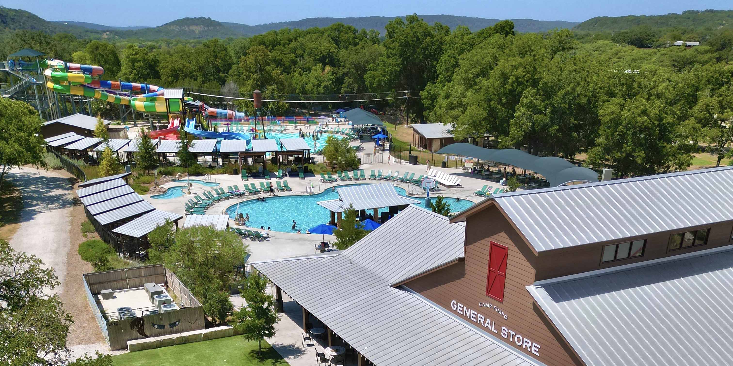 An aerial view of the water attractions and facilities at Camp Fimfo Texas Hill Country