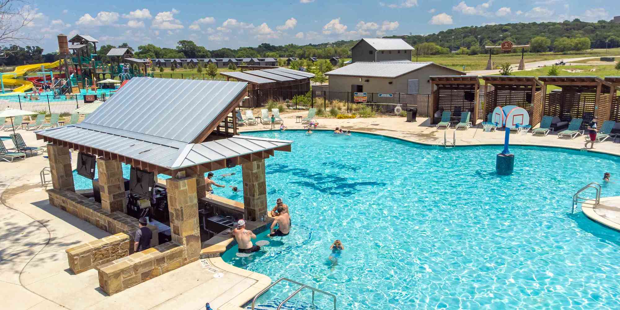 A drone shot of the water amenities at Camp Fimfo Waco