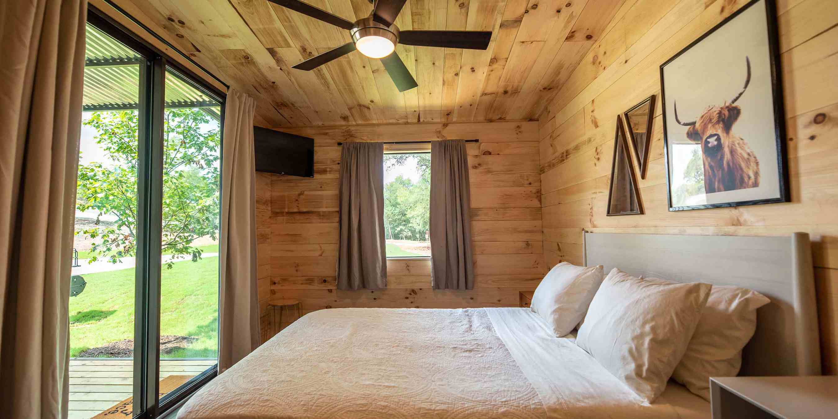 The master bedroom in a Coyote Cabin at Camp Fimfo Texas Hill Country