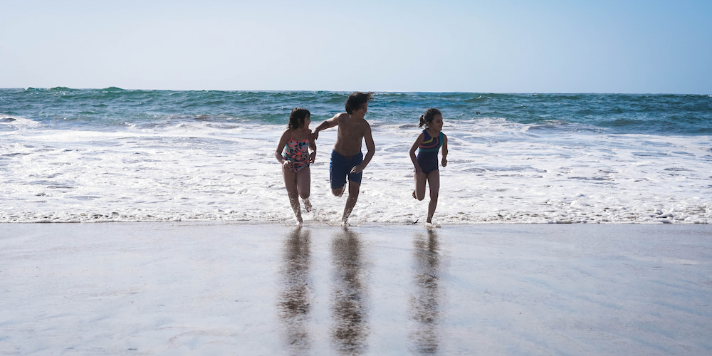 Take a breather at the beach during your Boston road trip.