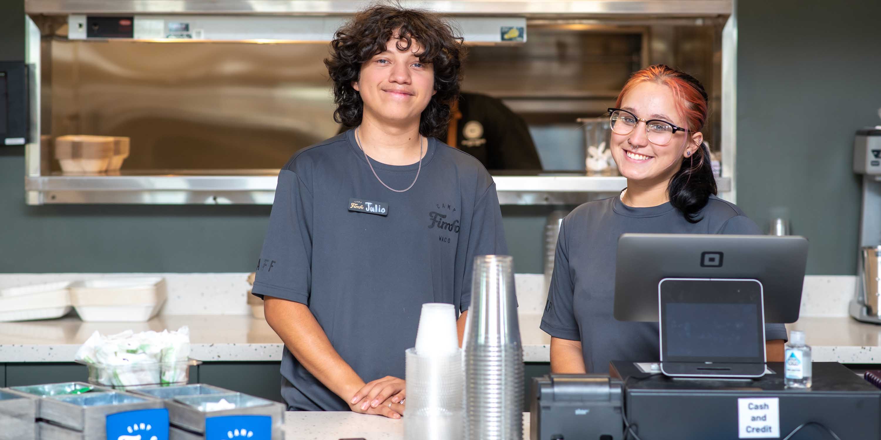 Two Camp Fimfo mess hall employees