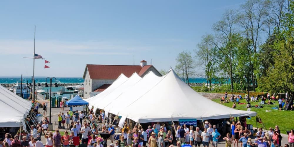 People enjoying a top event in Traverse City - the Leland Wine & Food Festival.