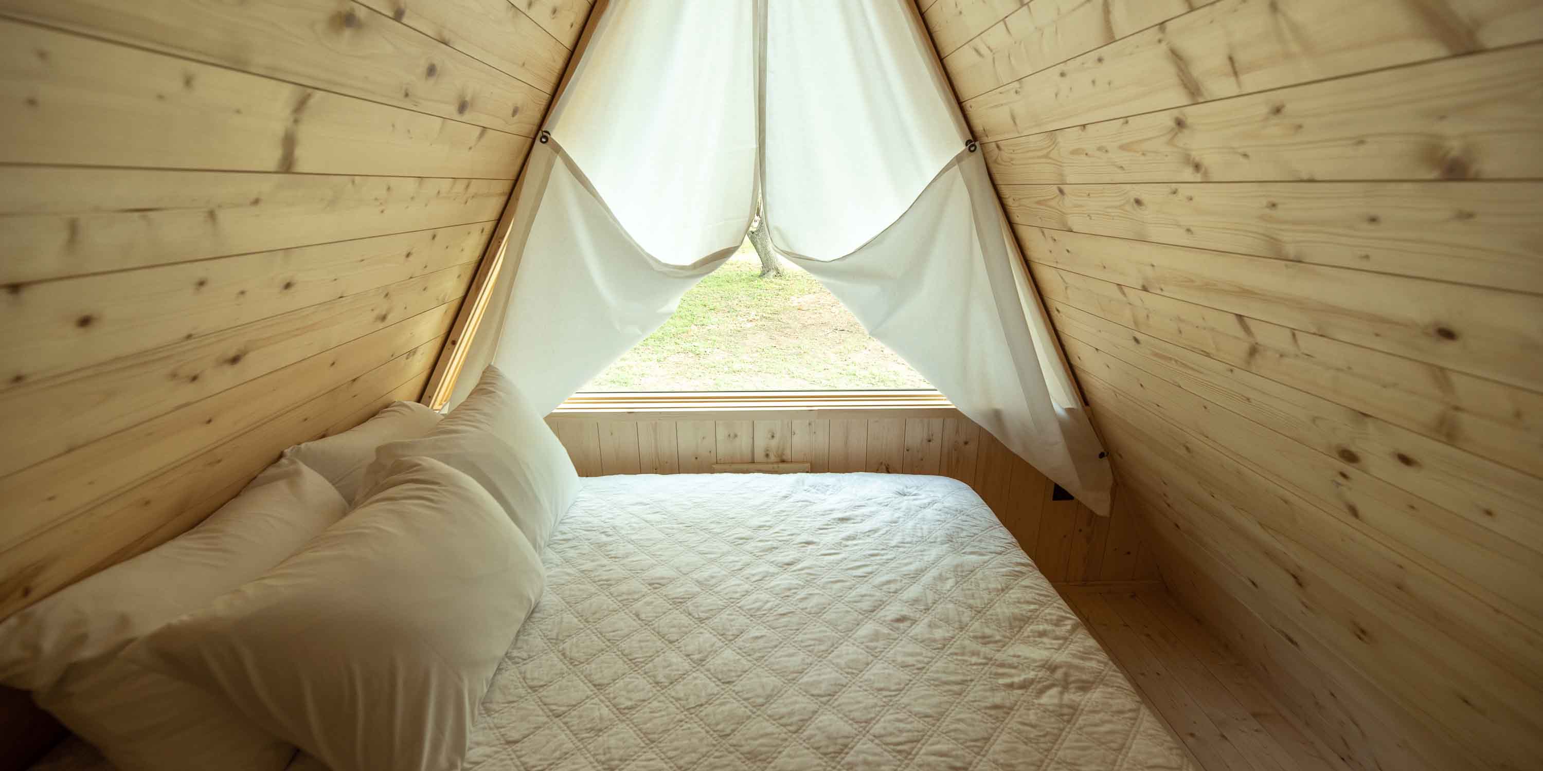 The interior of a Riverview Cabin at Camp Fimfo Texas Hill Country