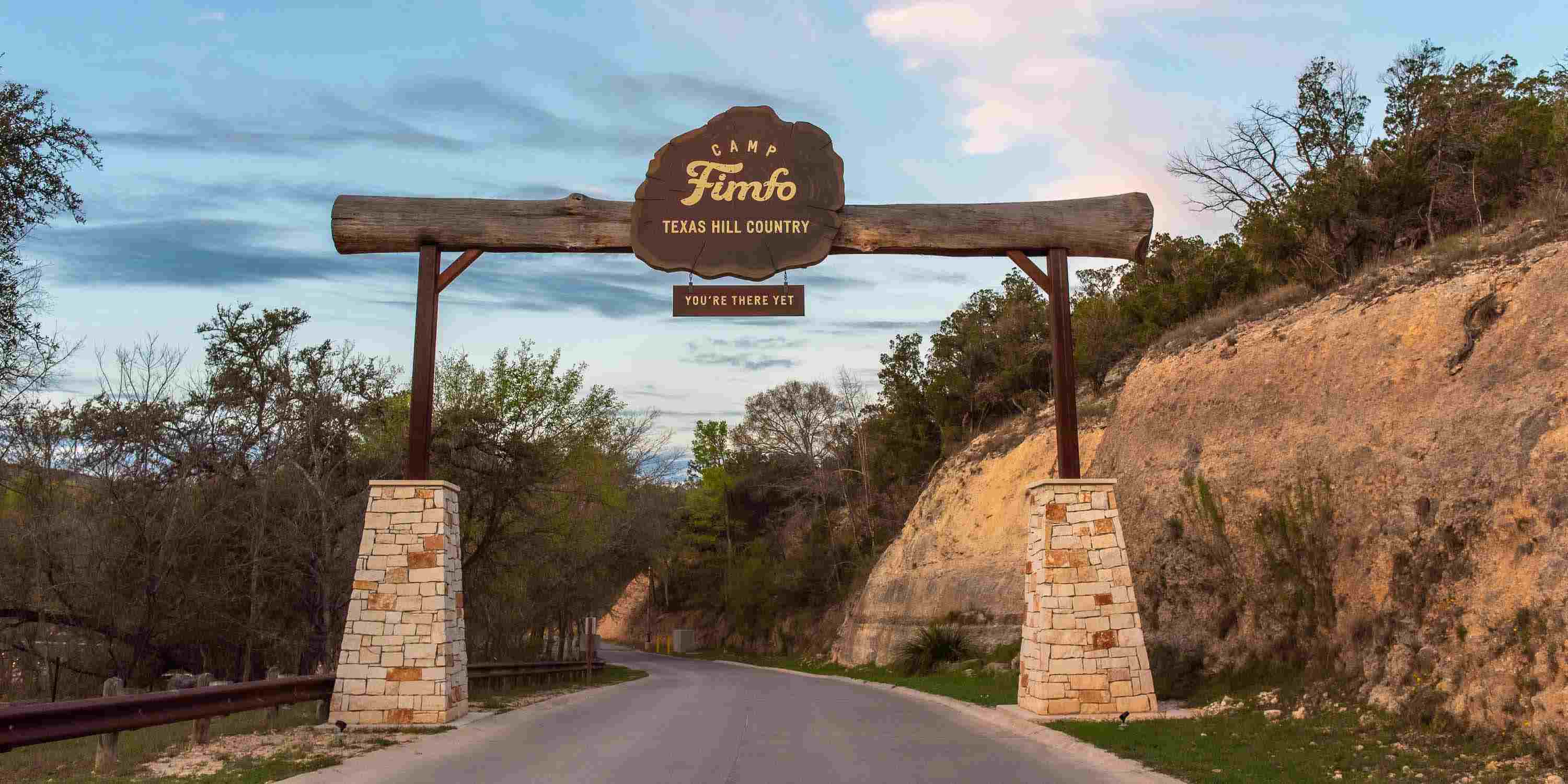 The entrance sign at Camp Fimfo Texas Hill Country