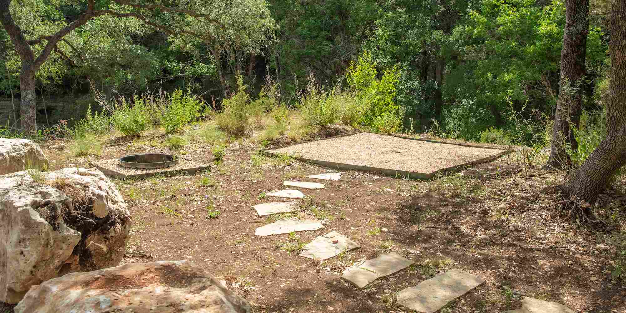 A tent camping site at Camp Fimfo Texas Hill Country