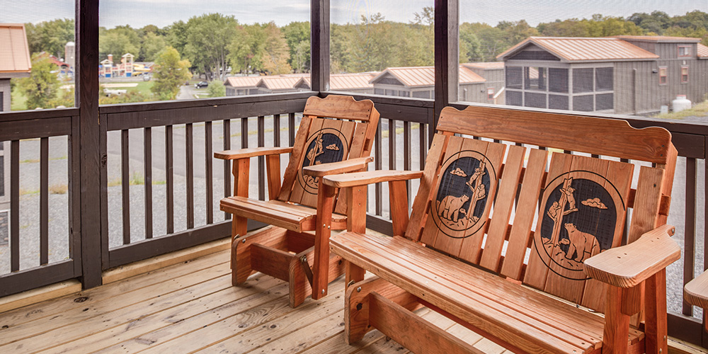 Enjoy a screened in porch while glamping in New York.