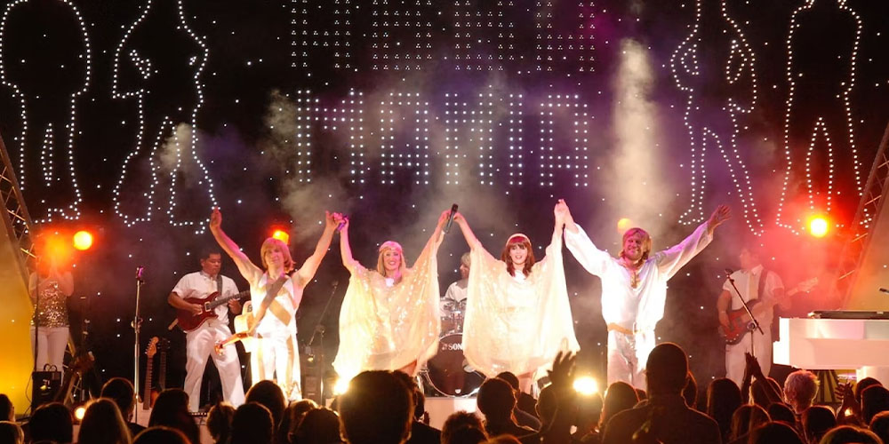 Mania - The Abba Tribute performing at the Majestic Theatre during a Dallas event.