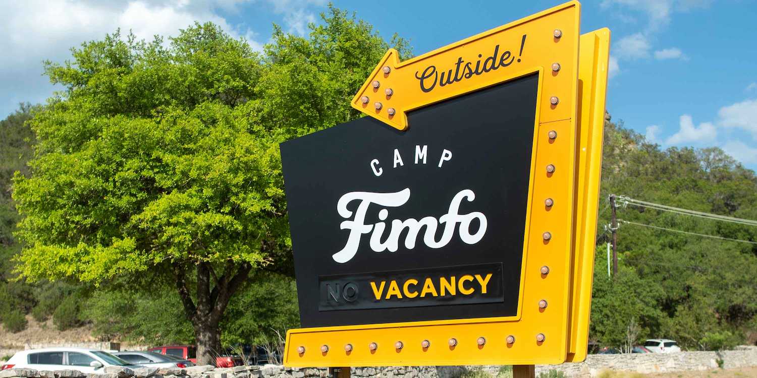 The entrance sign at Camp Fimfo Texas Hill Country