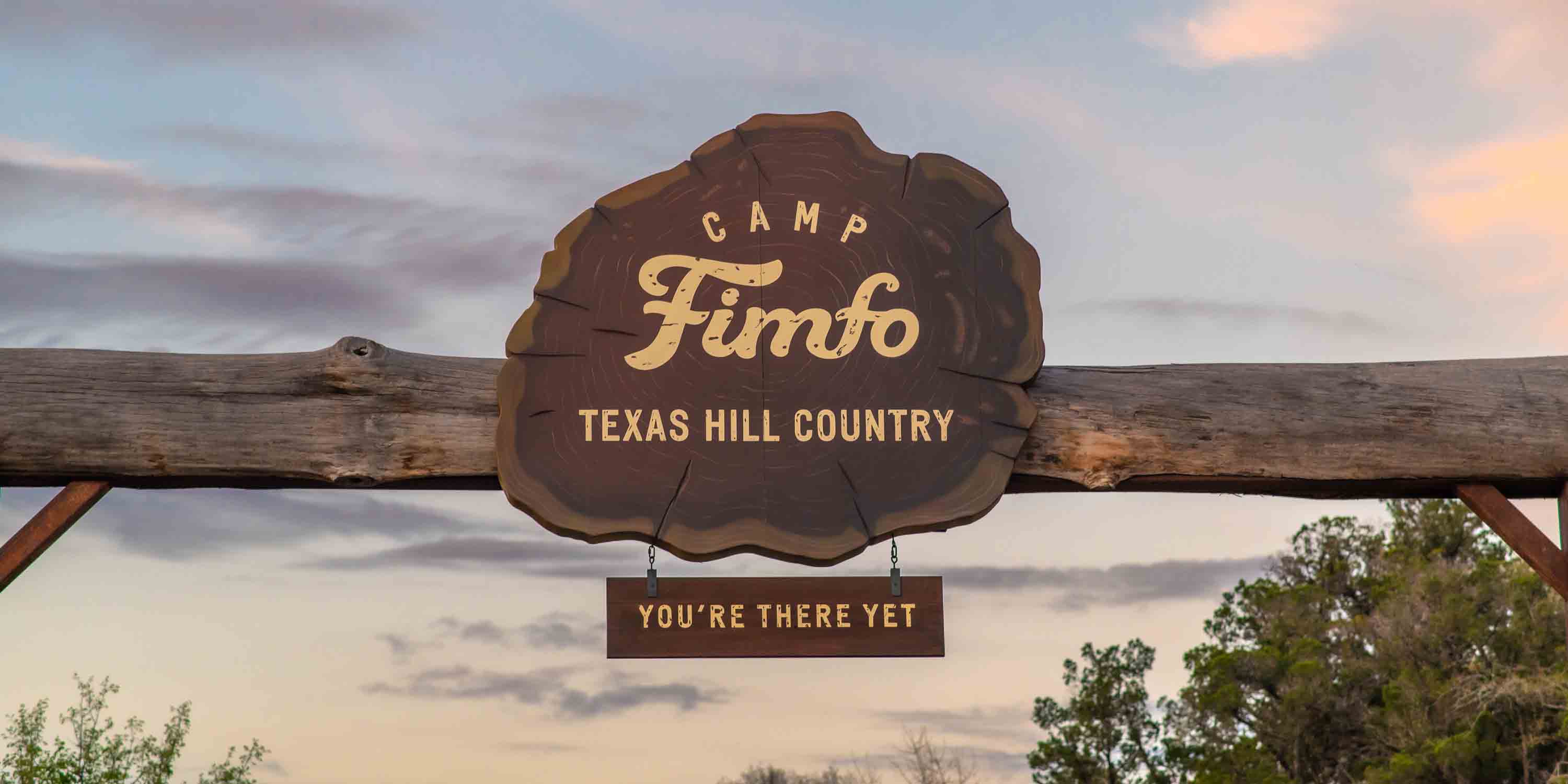 The entrance sign at Camp Fimfo Texas Hill Country