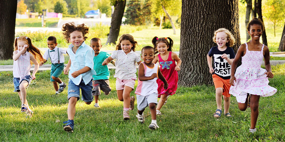 Kids running during Kids Day in the Park, a top Sacramento event.