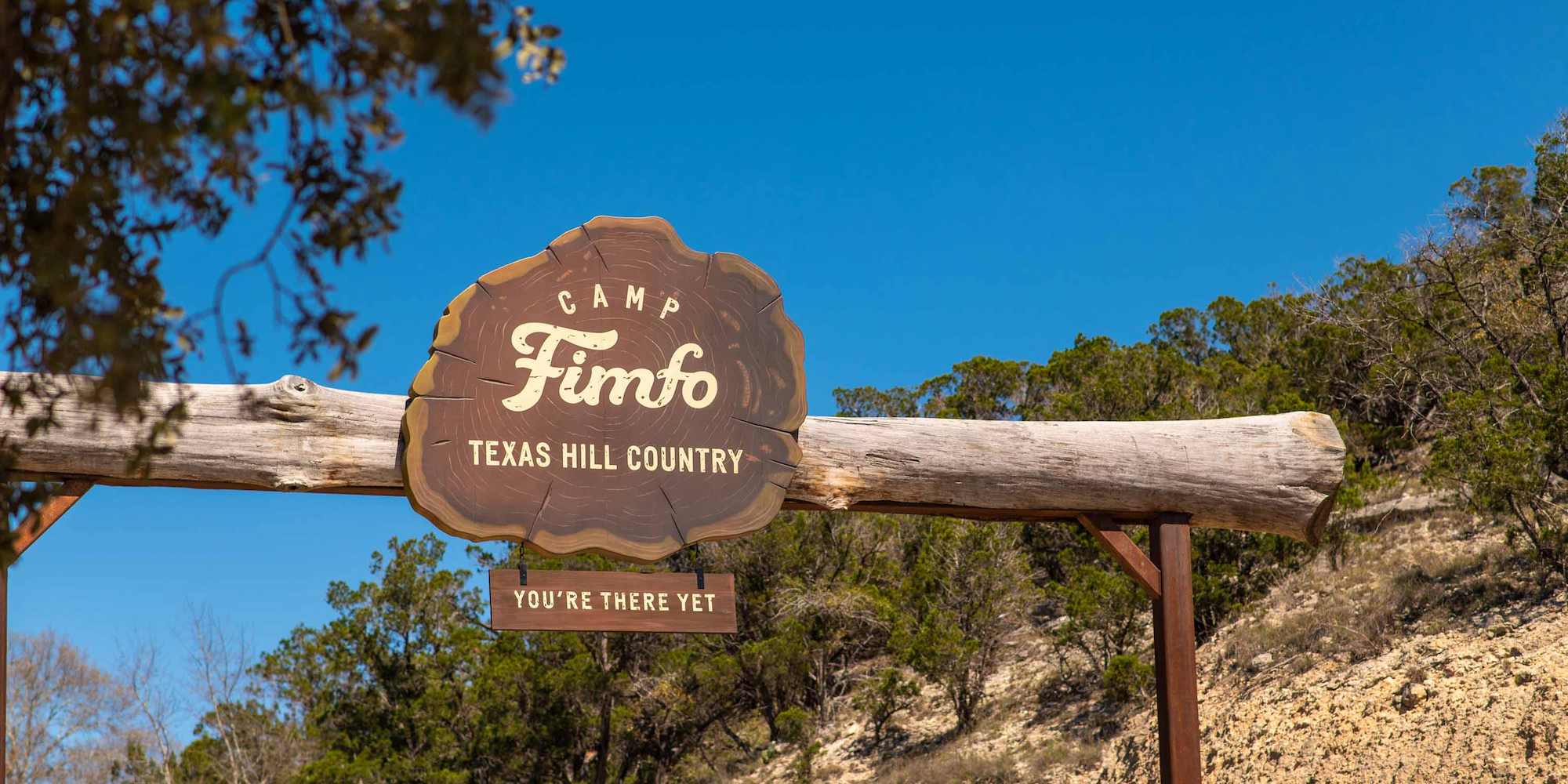 The entrance sign at Camp Fimfo Texas Hill Country