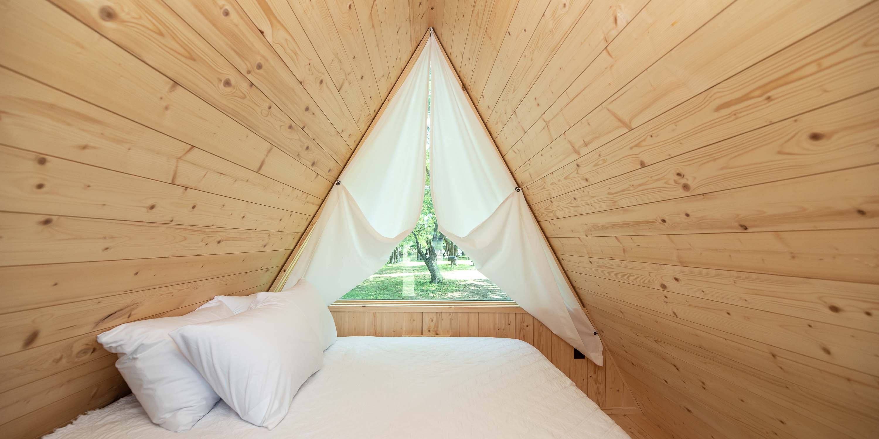 The inside of a Riverview Cabin at Camp Fimfo Texas Hill Country