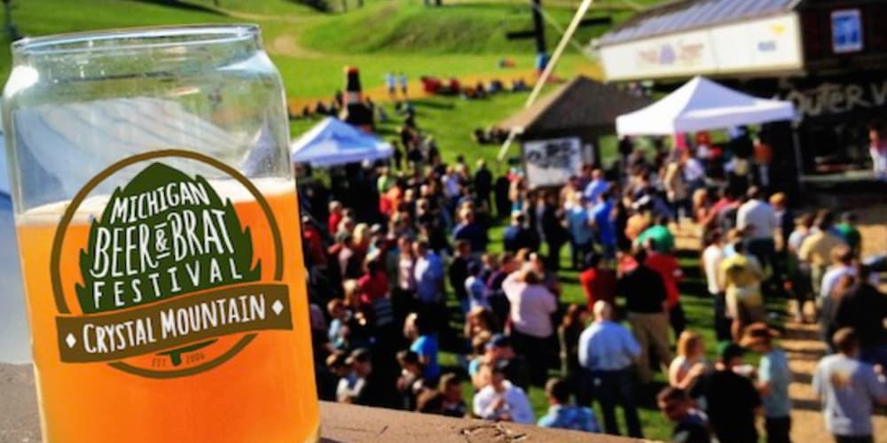 People enjoying a cup of beer at the Michigan Beer & Brat Festival in Traverse City, MI.