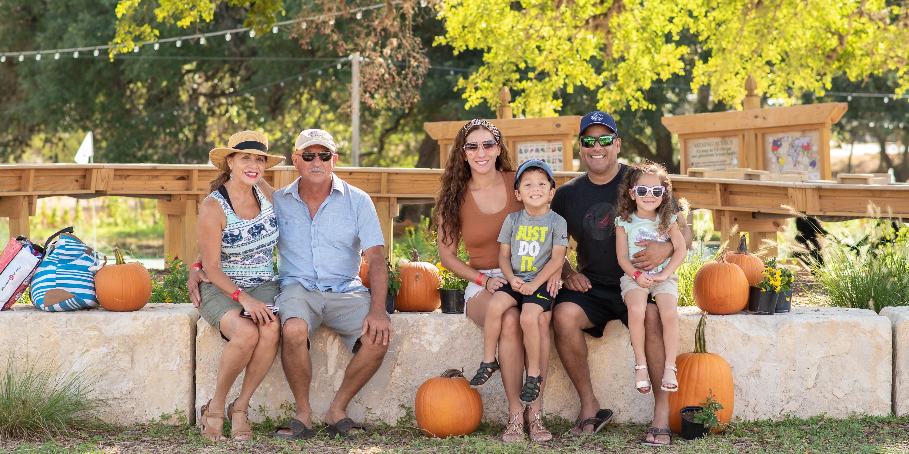 A family at a Camp Fimfo Fall Fest event