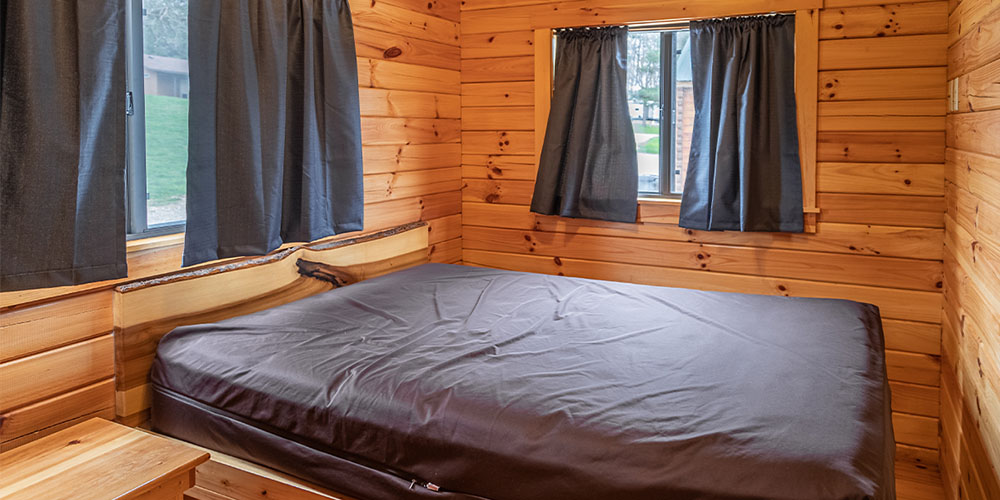 Enjoy a private bedroom in our Deluxe Cottages, a great Ohio luxury cabin option.