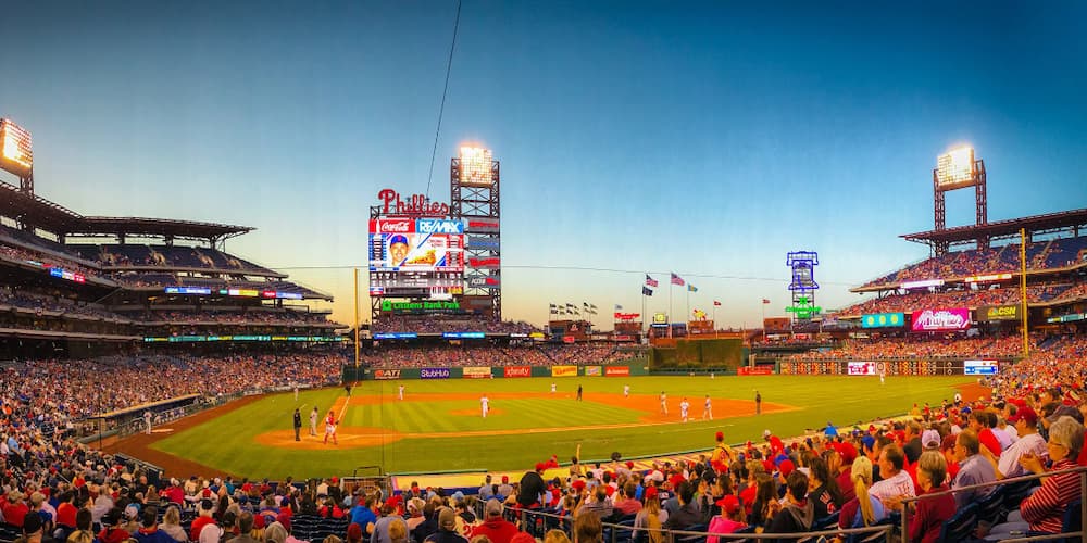 Crowd gathered around the Philadelphia baseball game.