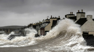 Waves crashing into houses