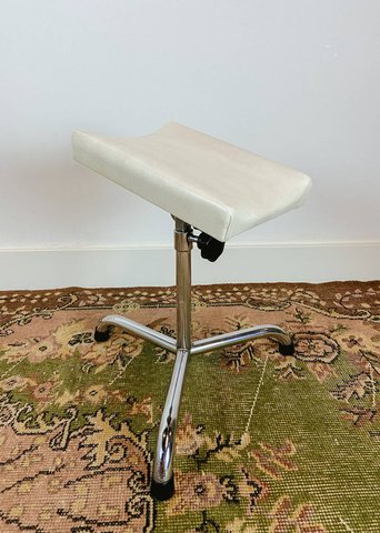 Vintage pedicure chair with foot stool