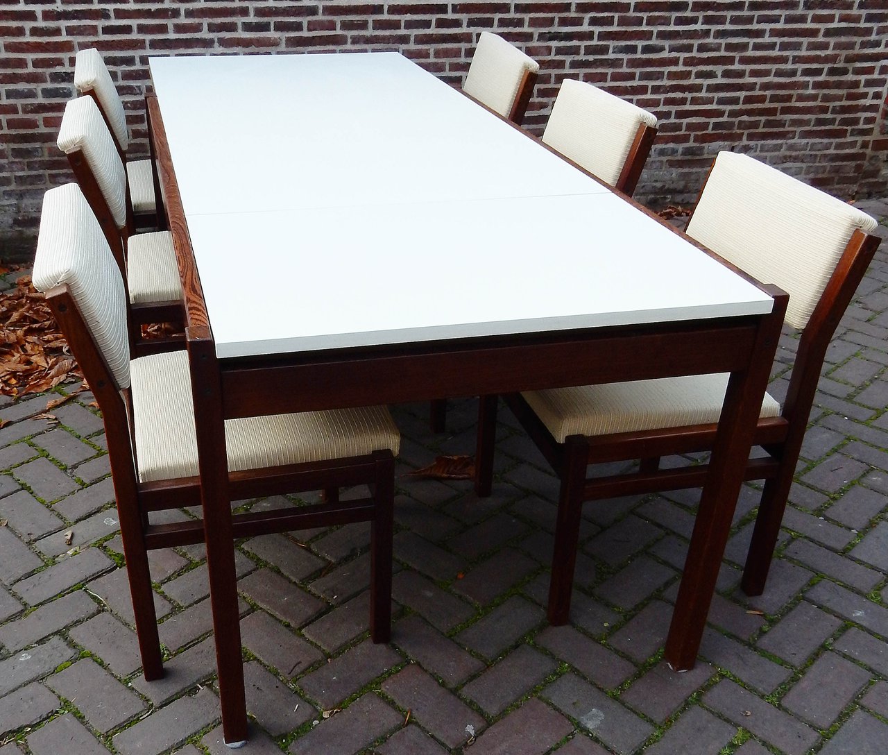 Pastoe dining table with 6 chairs, Cees Braakman.