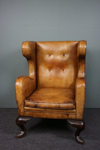 Vintage sheepskin leather armchair