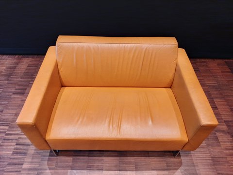 2x Artifort Mare sofas ocher yellow