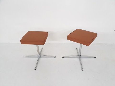 2 mid-century swivel stools