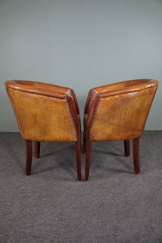 Set of two sheep leather tubchairs, side chairs
