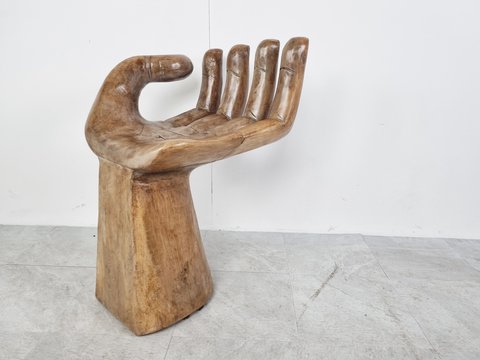 Vintage wooden hand shaped chair