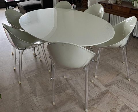 Kartell glossy table and Mr impossible chairs
