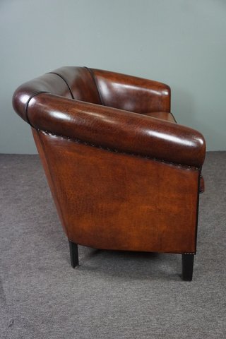 Sheep leather sofa finished with black piping, 2.5 seater