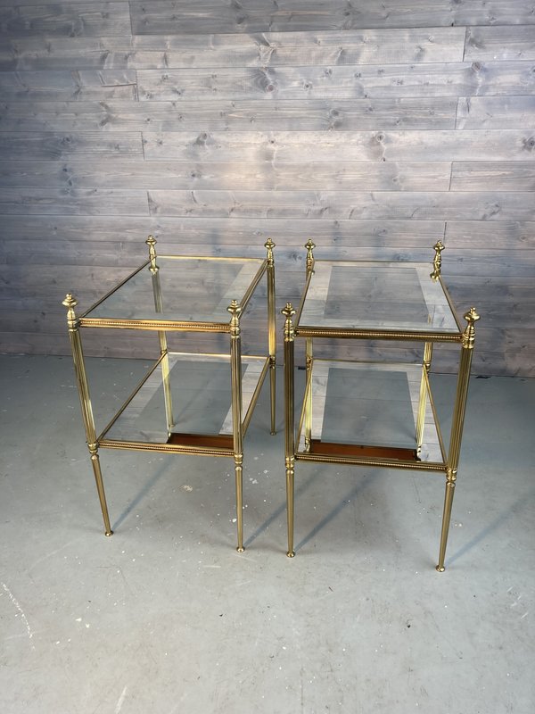 Pair of French 1960's two-tier brass tables with mirrored borders