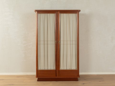 vintage wardrobe with curtains