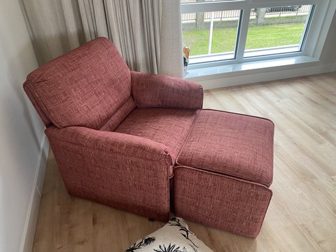 Leolux armchair with matching footstool