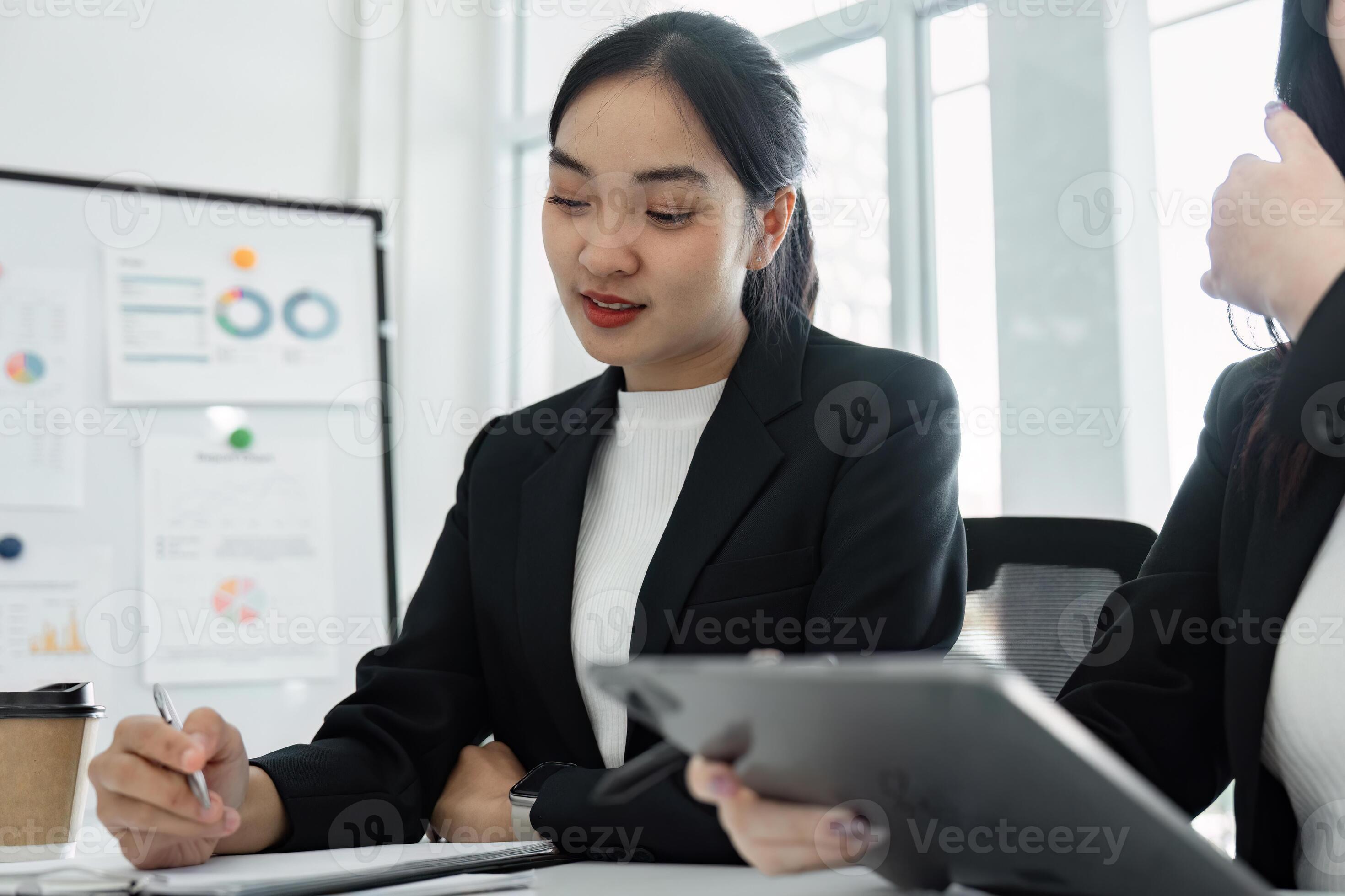 focused business professionals analyzing data
