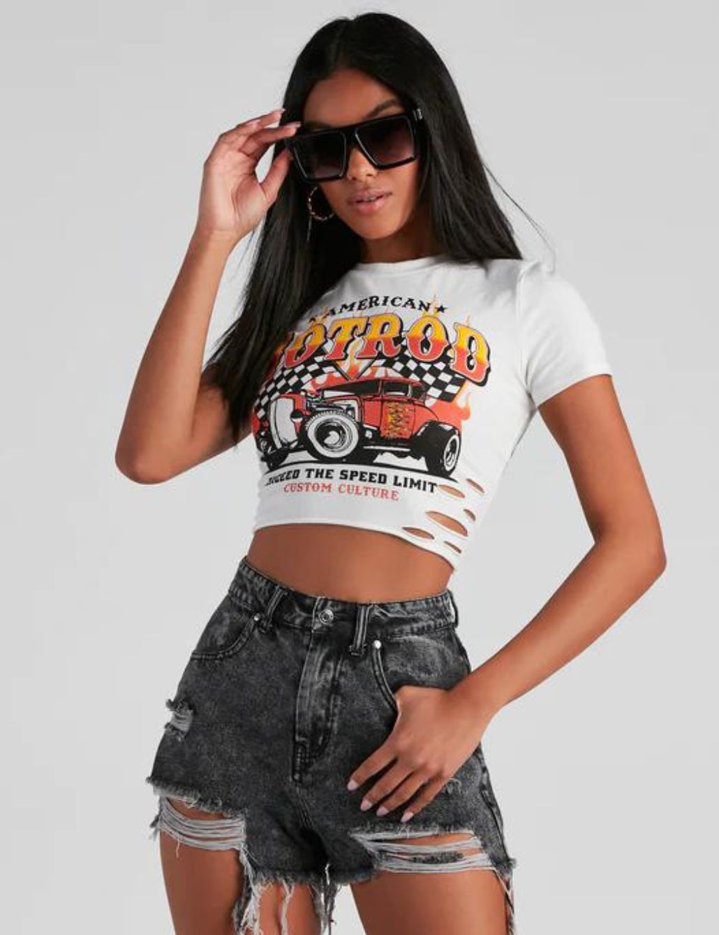 Music festival outfit idea: Cropped tee shirt, flannel shirt, ripped denim  shorts, stack of bracelets,…