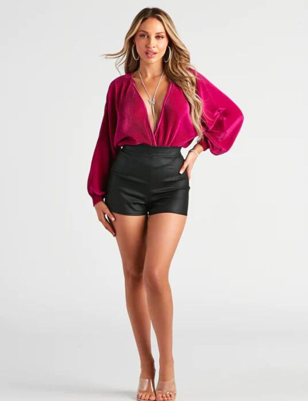 https://storage.googleapis.com/windsor-cms/media/2023/04/80ec4d33-long-sleeve-surplice-bodysuit-shorts-outfit.jpg