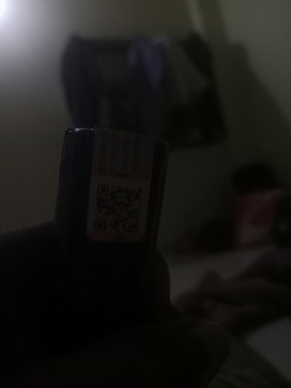 Due to the low quality of the image, I am unable to identify the wine name. - Image 1
