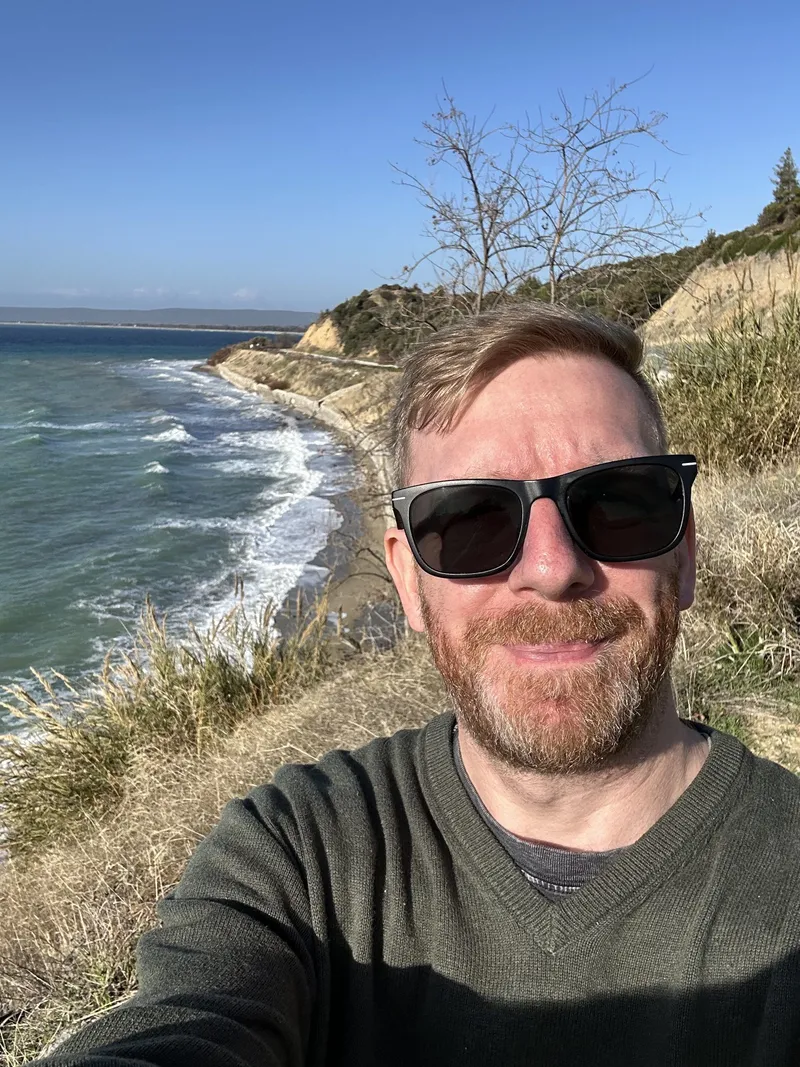 Chris taking a selfie on the cliffs above Anzac Cove