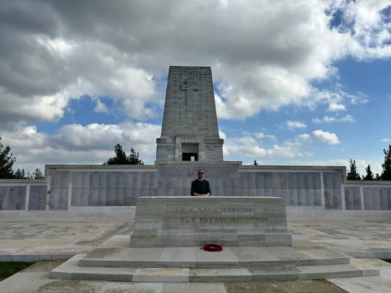 The Lone Pine memorial with a poppy wreath at its base