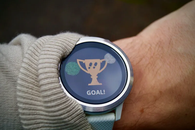 a close up of a person’s wrist with a watch on it