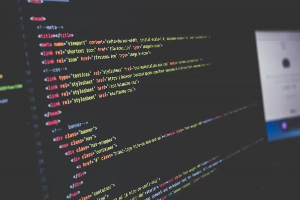 HTML code on a laptop screen