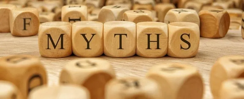 Wooden letter dice spelling MYTHS
