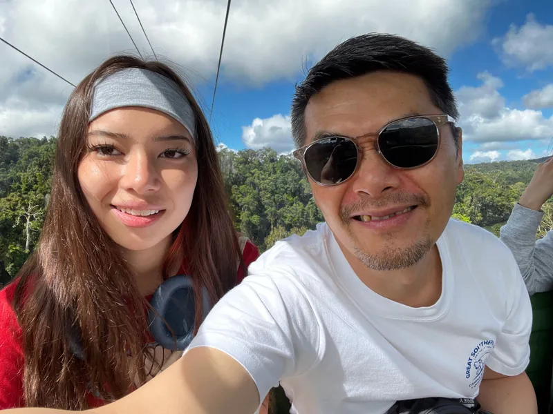 A selfie of a girl and a man in the gondola