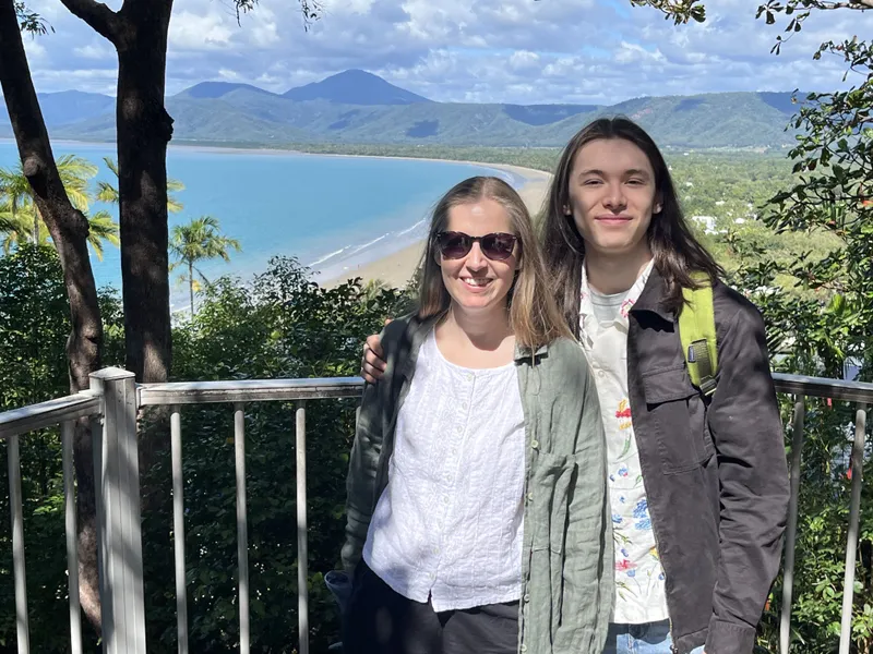 Two people at the lookout above the beach