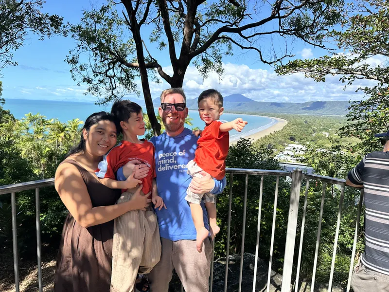A family with two boys at the lookout railing