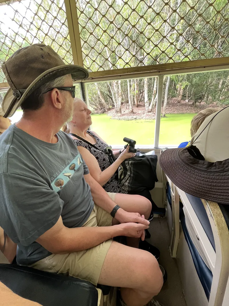 A man in a bush hat on the boat cruise