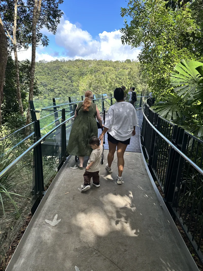 Family walking along the boardwalk to the lookout