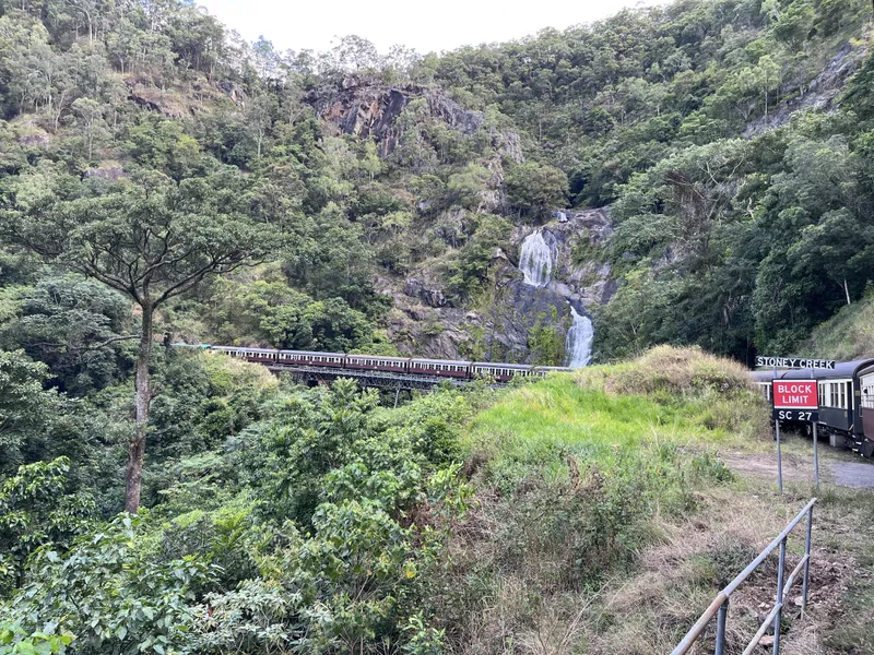 Stoney Creek Falls and the curved bridge, with the train behind